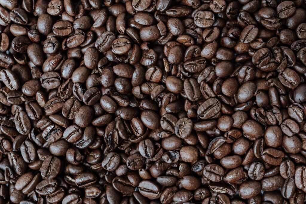 a handful of dark coffee beans
